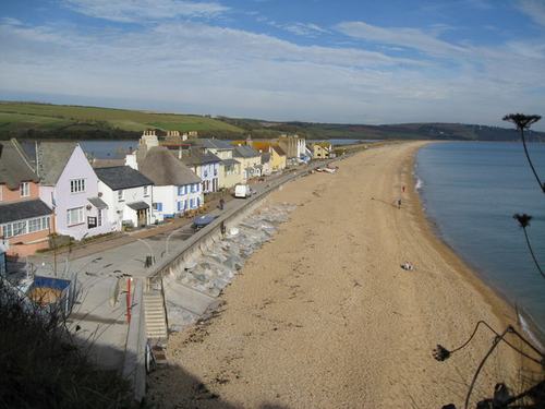 The sea wall and promenade in front of houses at Torcross